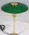 Poul Henningsen PH 3/2 with green lacquered brass shades. Base in brass. Annivesary edition from the 1990s This piece is...