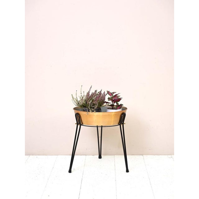 Original Scandinavian planter. A practical and small size contained object to be used as a raise and pot for plants. The...