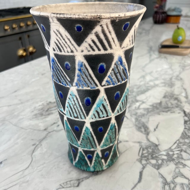 Stunning midcentury vintage studio art pottery vase. Likely Swedish. Features geometric patterns in varying shades of...