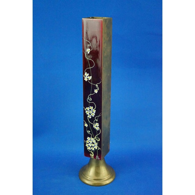 Item description: A stunning square-sectioned single-flower vase in gilded bronze, with one of the four sides richly...