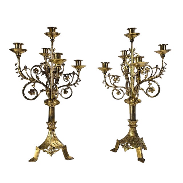 This vintage pair of gilt brass candlesticks is a true beauty. The intricate design of these 5 arm candle holders and...