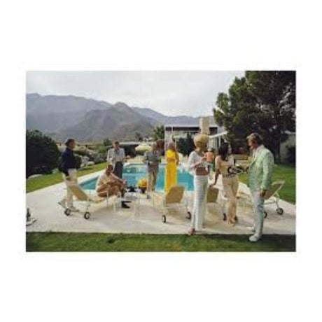 A poolside party at a desert house, designed by Richard Neutra for Edgar J. Kaufmann, in Palm Springs, January 1970....