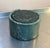 1970s-80s postmodern green marble coaster set in stand/box; set of 6. Excellent condition. Coasters measure 4" diameter each.