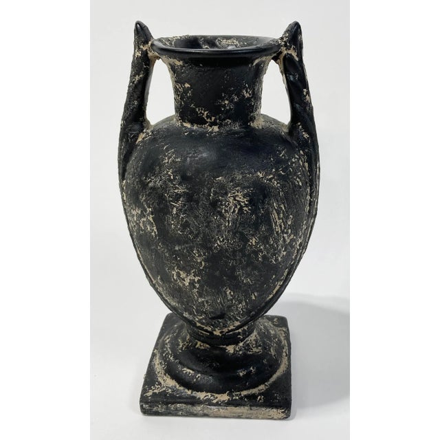 Vintage Grecian style pottery urn vase with weathered matte black finish. A classic decorative accessory or even bookend....