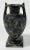 Vintage Grecian style pottery urn vase with weathered matte black finish. A classic decorative accessory or even bookend....
