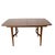 This walnut dining table pairs a clean, rounded-corner top with a distinctly sculptural base — tapered legs joined by a...