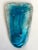 Here is a beautiful face mask made of blue and transparent glass. It has a wonderful modern feel and would be great as a...