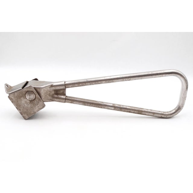 Reclaimed New York City subway strap handle made of brass with a nickel finish. Good condition with surface wear and rust...