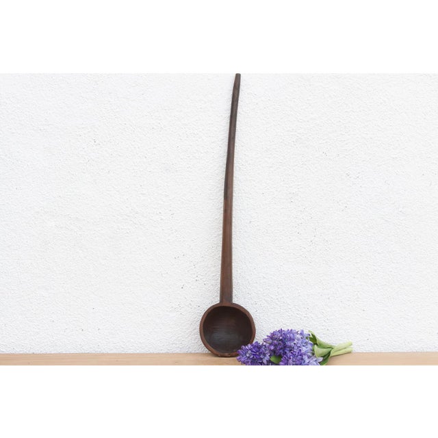 There is something deeply soulful about a simple wooden spoon—especially one carved by hand to feed a village. This...