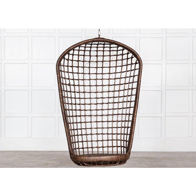 Circa mid 20th Century. Mid Century French bamboo rattan swinging egg chair. Measures: W 76 x D 50 x H 110 cm.