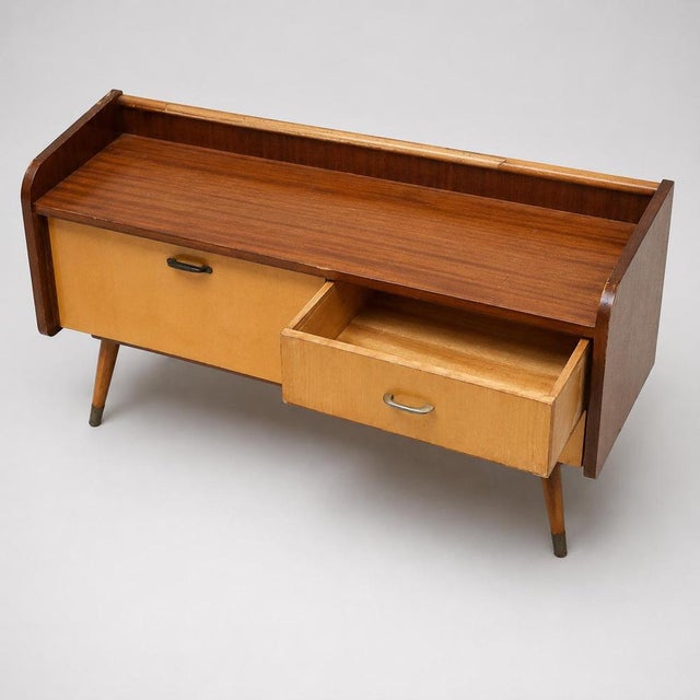 Vintage low sideboard hallway cabinet with flap and 2 drawers. Give your interior character with this stylish vintage low...