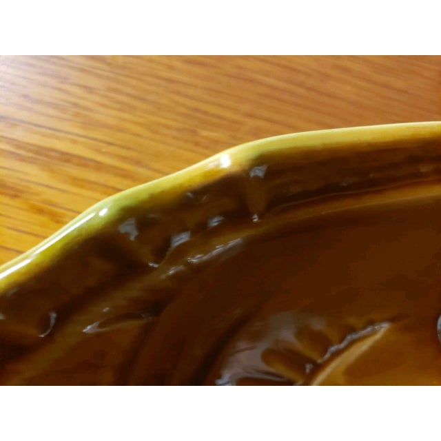 This is a Vintage Sarrequemines Ceramic Bowl, French, Glazed Finish, Fish Motif. It measures 1 3/4" high and 8“ in...