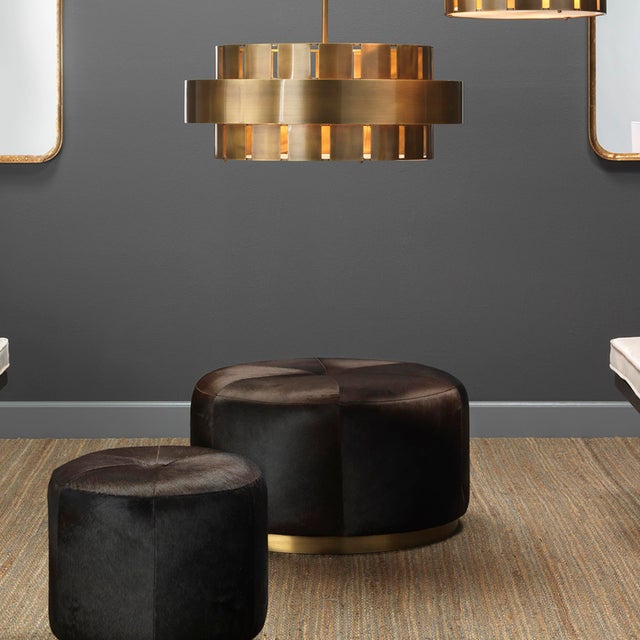 The Thackery collection of hair-on-hide poufs have the unique ability to add both glamour and comfort to any room of the...