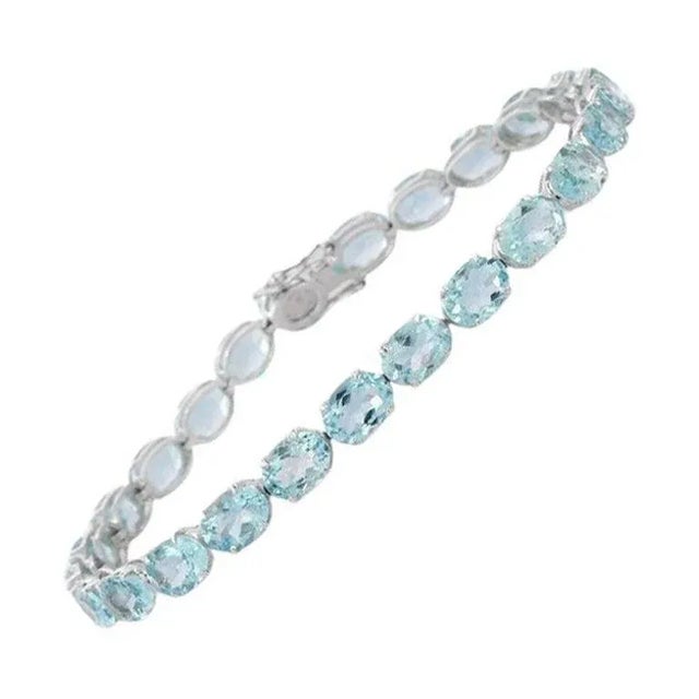This is part of Chairish’s Fine Jewelry assortment. This Aquamarine Tennis Bracelet in 18K gold showcases 25 endlessly...