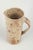 European studio potter Pitcher, 1980s. Unique hand-thrown stoneware pitcher with rustic glaze in beige and brown tones,...
