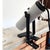Vintage 1970s white cylindrical metal spotlight clamp lamp in style of Targetti, features an adjustable black metal arm...