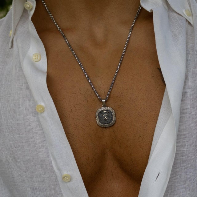 Command respect and embody strength with the Regal Lion Medallion Men’s Sterling Silver Necklace. Handcrafted from high-...