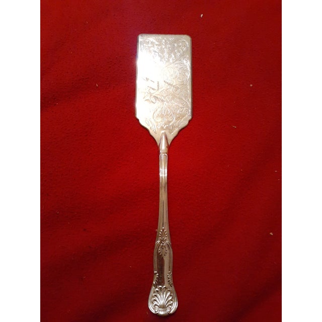 This is a GORFEOUS Sheffield Silverplated Ornate 12" Cake Server. Procured at auction KITCHEN