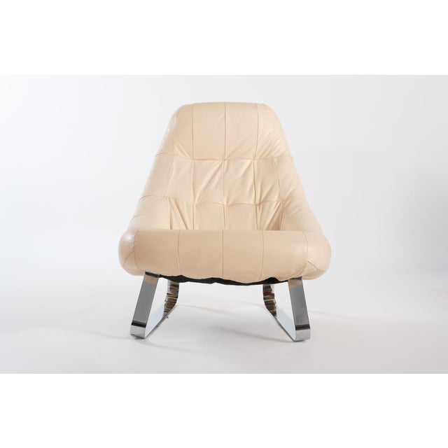 Brazilian designer Percival Lafer looked at the standard lounge chair and apparently thought: what if it actually held...
