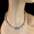 This exquisite multi-color beryl necklace is a true celebration of elegance and natural beauty. Measuring a perfect 16...