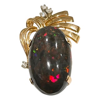 30 Carat Oval Ethiopian Black Opal Pendant 18 Karat Yellow Gold For Sale