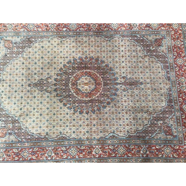 Beautiful mid-20th century rug with beautiful floral design with a central medallion and nice colors with beige field,...