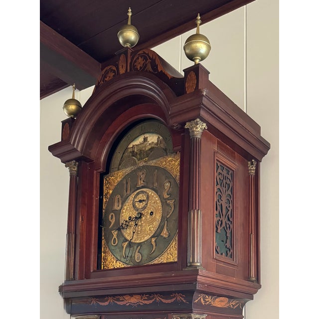 Beautiful 8 ft. tall case English clock (without brass finials) made out of mahogany and other neoclassical marquetry of...