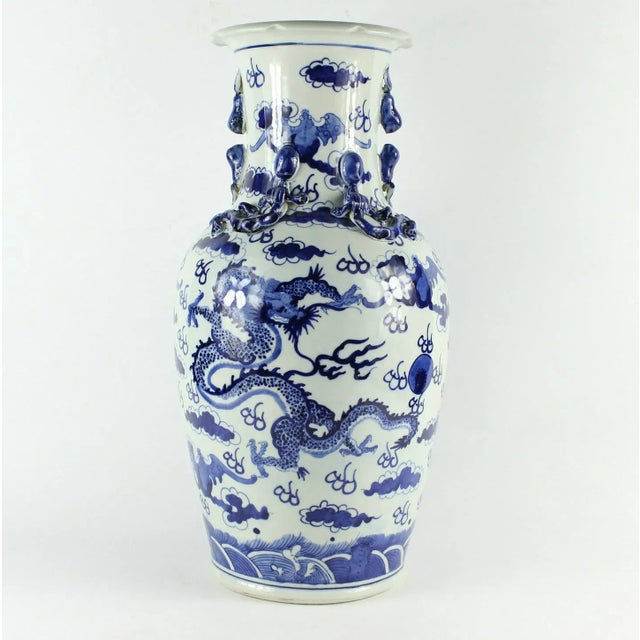 16.5" tall vase in Blue/White porcelain with Dragon design motif.Pair