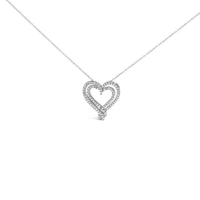 Immerse yourself in the timeless elegance of this sterling silver pendant necklace, where romance and refinement...