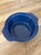 A blue speckled stoneware or ceramic bowl with two side handles, commonly produced by makers like Cerutil or Von Pok &...