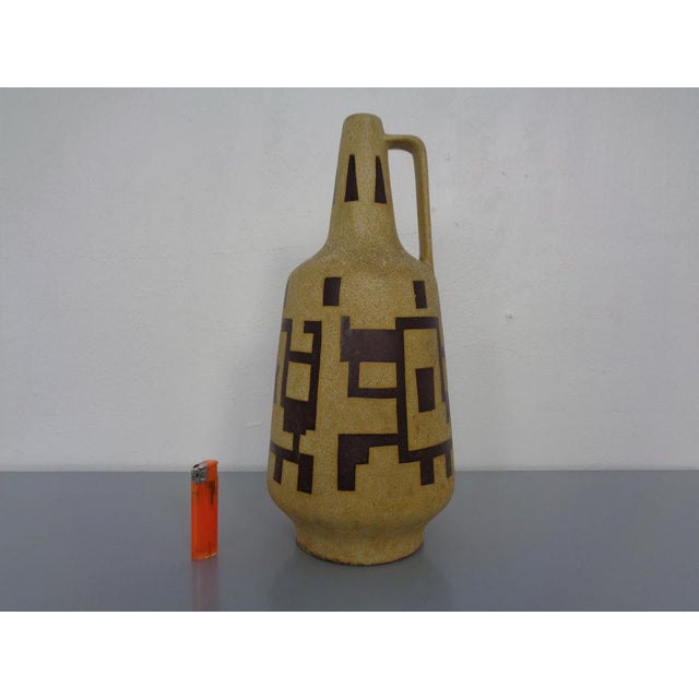 Vase with handle made of ceramic from the 1950s.