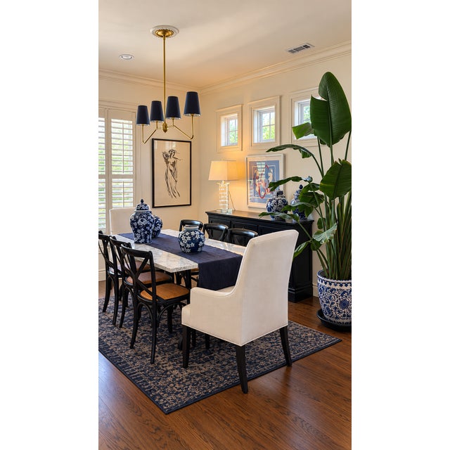 cription Williams Sonoma La Coupole rectangular dining table featuring a substantial natural Carrara marble top paired...