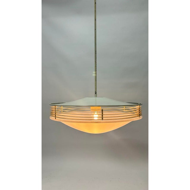 Stilnovo stamp on the top of the lamp. Light wear due to age and use. This piece has an attribution mark, I am sure that...