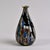 Found in Italy, this vase by Carlo Moretti dates from the 1990s. This mouth blown piece is 11.5” tall and is decorated...