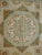 Hand-knotted vintage style runner rug with geometric and octagonal medallions in neutral and muted tones of beige, cream...