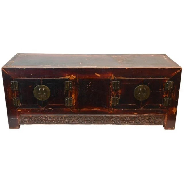 This very substantial and heavy antique Chinese cabinet has been beautifully preserved with evidence of wear from daily...