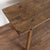 19th century rustic console table crafted in hardwood with squared legs that splay slightly outward. The proportions are...