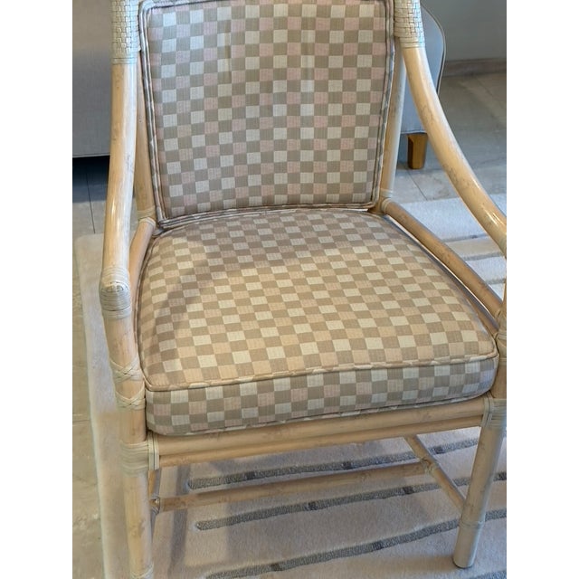 Sophisticated McGuire table with four matching chairs, showcasing the brand’s hallmark craftsmanship, refined proportions,...