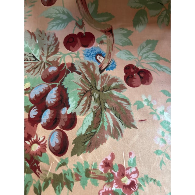 6 1/2 yards of gorgeous floral fabric featuring a peach background with white, blue, pink and red flowers.