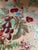 6 1/2 yards of gorgeous floral fabric featuring a peach background with white, blue, pink and red flowers.