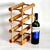 Offered is a 1970s wine rack designed by Richard Nissen for Langaa, Denmark. Beautiful minimalist wood peg design made of...