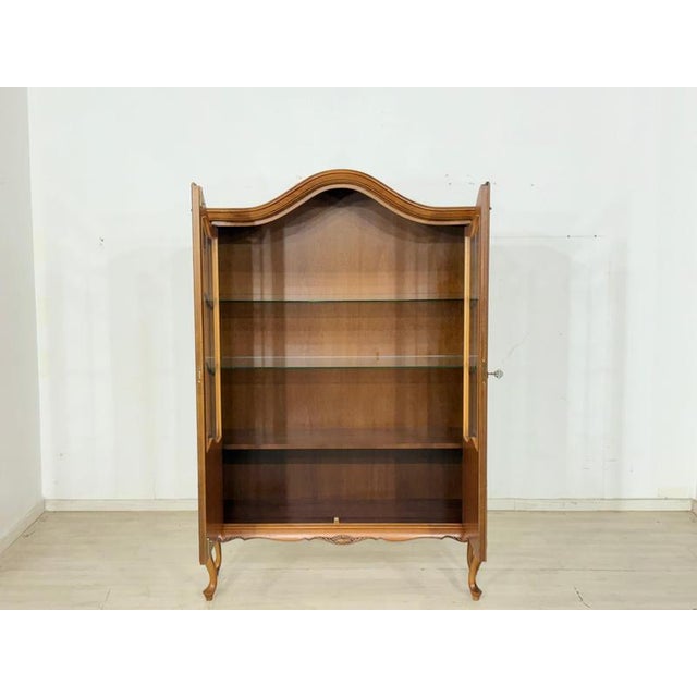 For sale is this beautiful, classic display cabinet in an elegant Baroque style, adding a touch of sophistication to any...