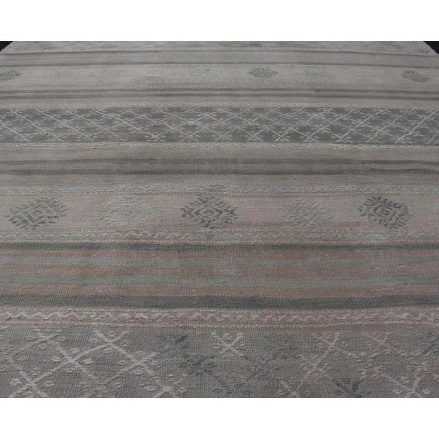 Tribal Muted Vintage Turkish Kilim Rug With Horizontal Stripes & Tribal Motifs For Sale - Image 3 of 11