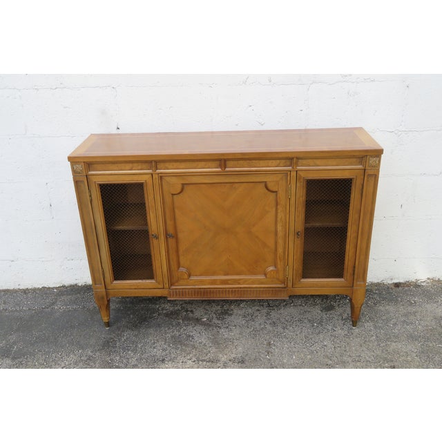 This magnificent Sideboard is made of wood, solid wood, veneer, and metal. This wonderful Sideboard is an excellent...