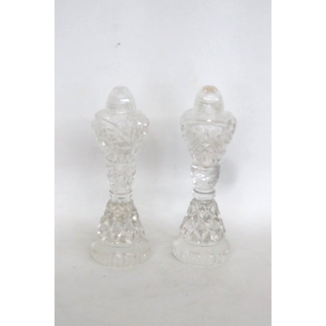 This beautiful Pair of Salt and Pepper Shakers is made of cut glass. Both Shakers in this lovely set present a gorgeous...