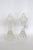 This beautiful Pair of Salt and Pepper Shakers is made of cut glass. Both Shakers in this lovely set present a gorgeous...