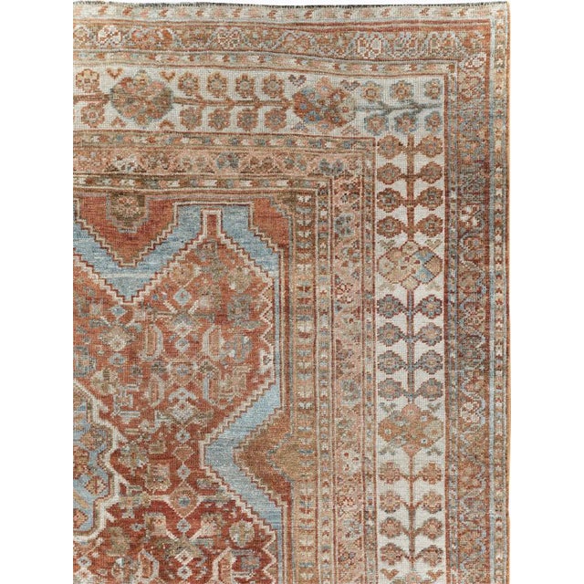 An antique Persian Shiraz accent Carpet handmade during the Early 20th century. Measures: 7' 0" x 9' 9"