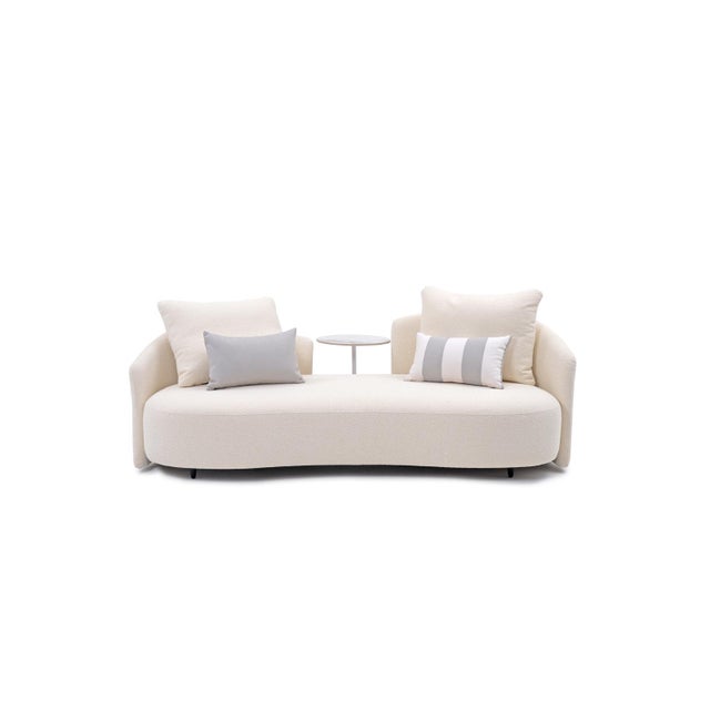 "Create a calm, resort-style outdoor space with the Luna Outdoor Lounge Collection. The soft curved shapes, plush...