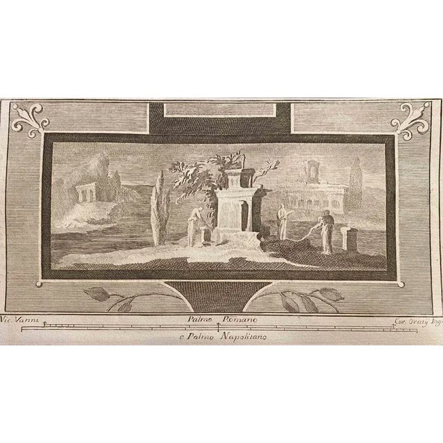 Roman Temple Fresco from "Antiquities of Herculaneum" is an etching on paper realized by Carlo Oraty in the 18th Century....