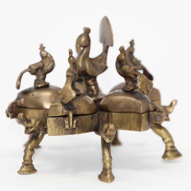 Antique Hindu brass decorative box. This is an antique Mughal style brass Indian ornate locking trinket box container. It...